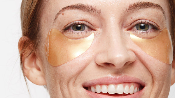 woman wearing depology under eye hydrogel patches