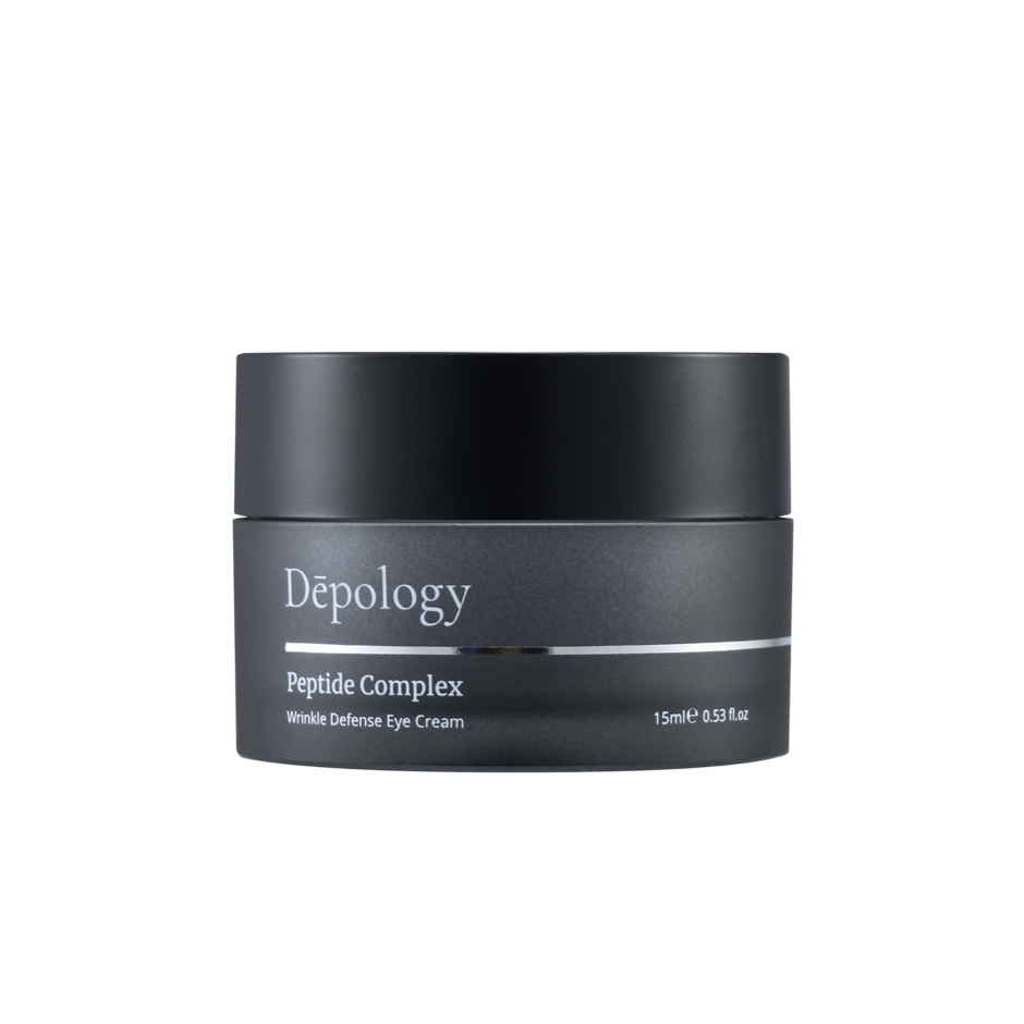 Black eye cream jar labeled 'Depology Peptide Complex' on a white background
